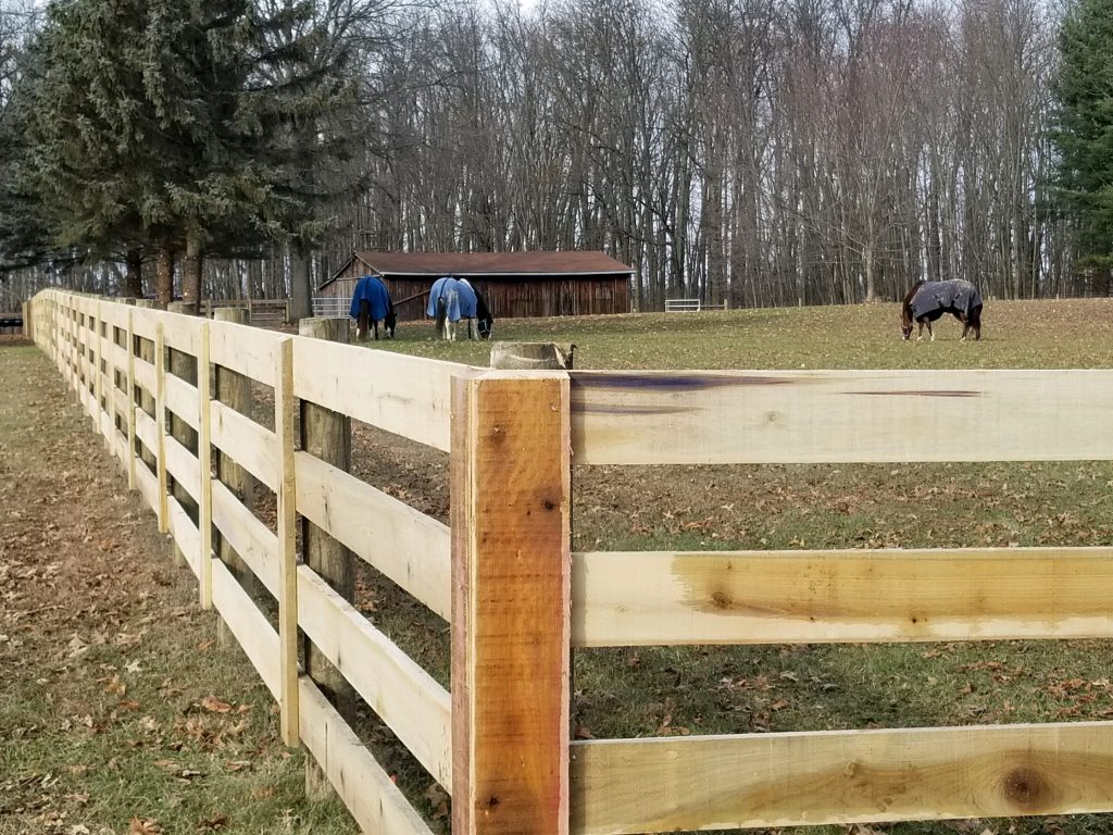 Example of board fence installation services in Ohio.